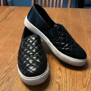 Black slip on quilted pattern shoes